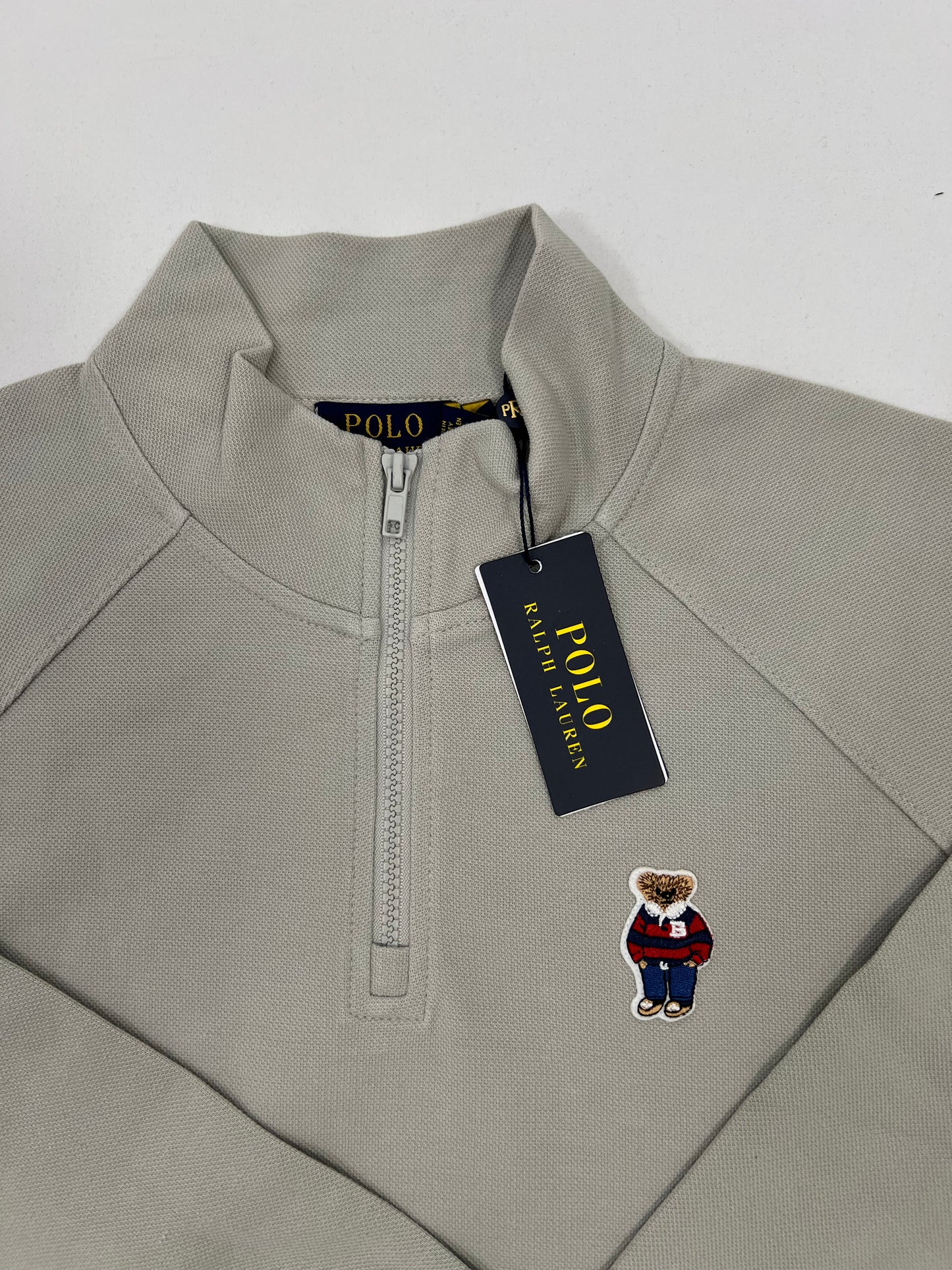 Polo Ralph Lauren Quarter-Zip Krem Duks sa Elegant Bear Logom