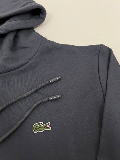Lacoste Titan-Plavi Duks sa Minimalistic Logom